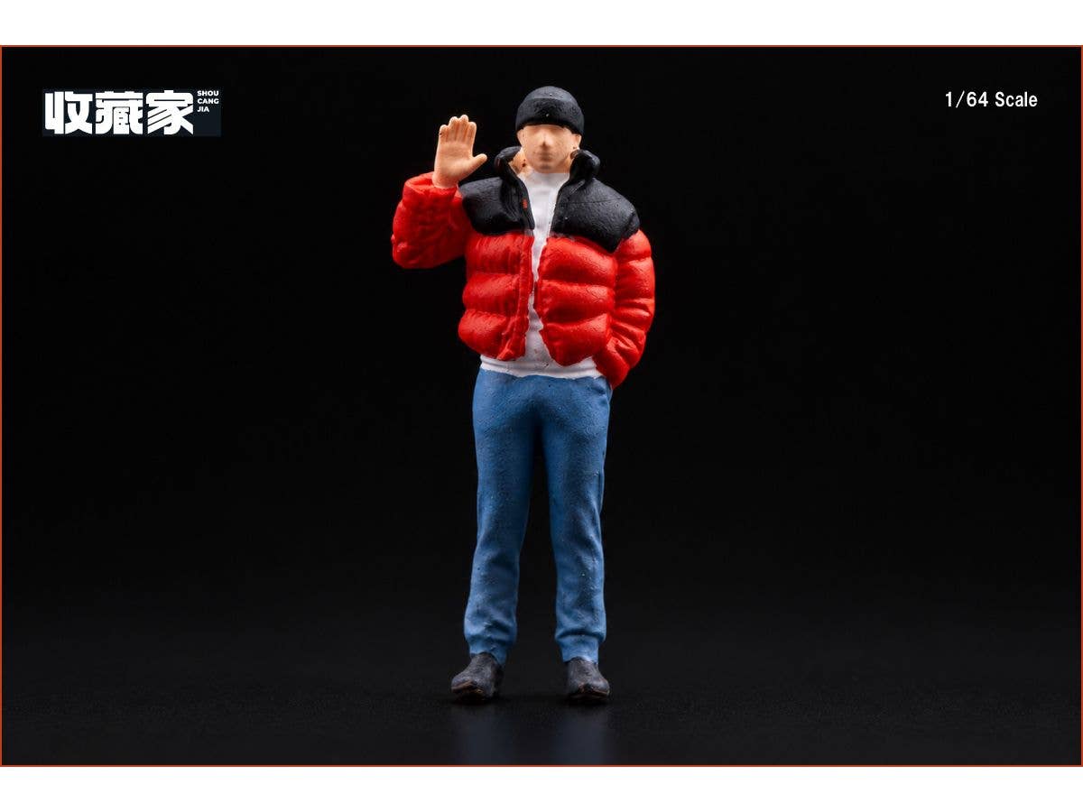 A man wearing a down jacket (orange down jacket)