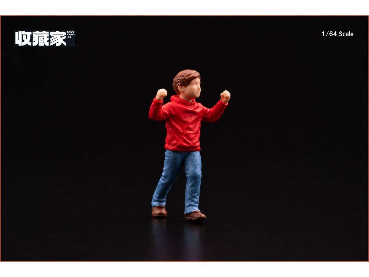 A boy in a red suit